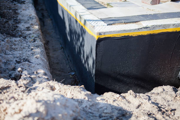 Professional Waterproofing technician working in Centreville, MD